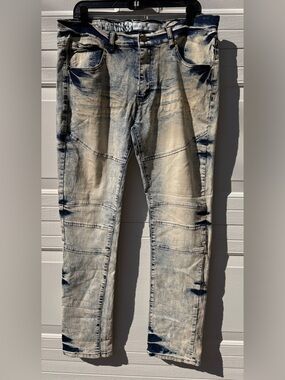 Reason New York blue jeans with distressed, faded, and patched details men’s 38